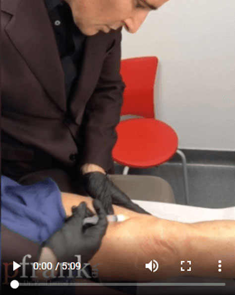Dr. Paul Jarrod Frank of PFrankMD injecting client