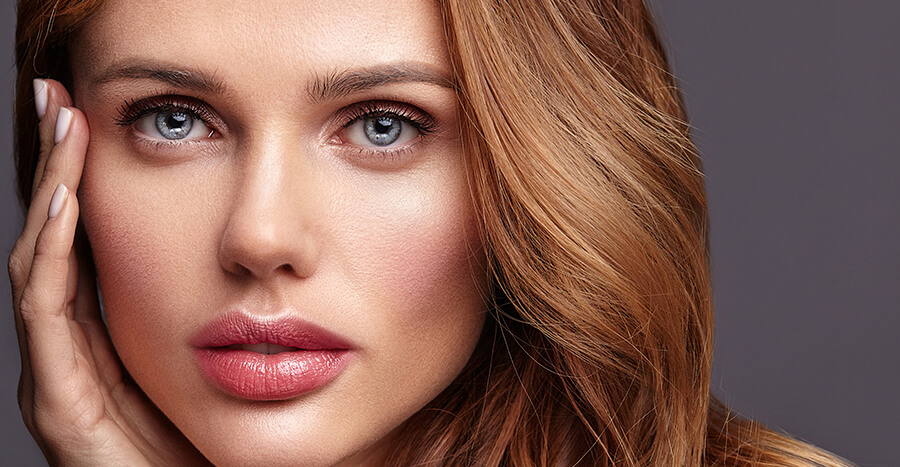 Woman touching face