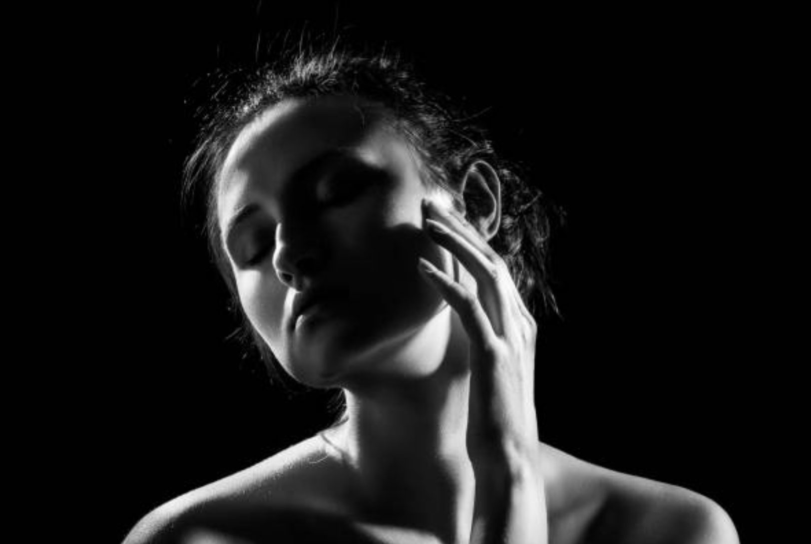 woman touching face